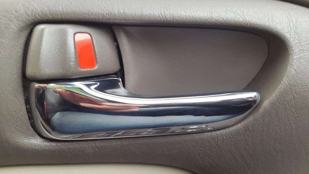 Interior door handle and trim
