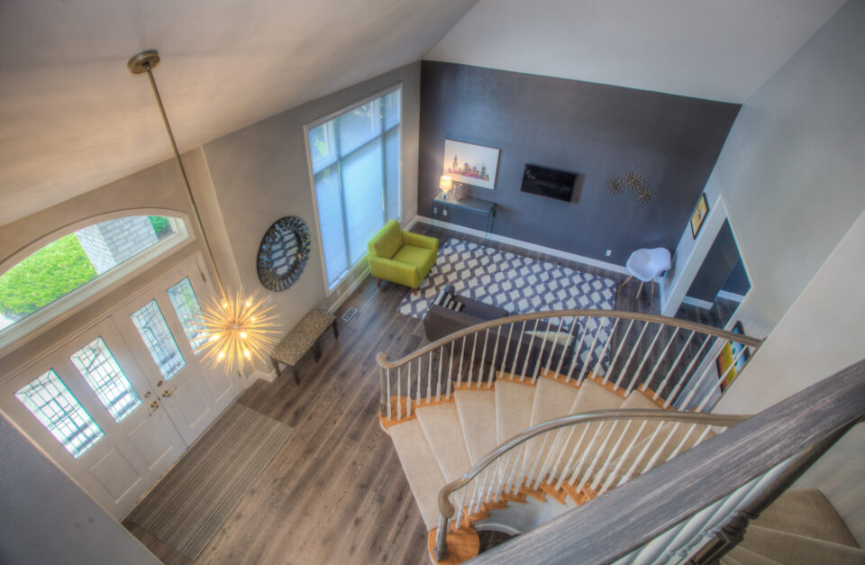 Staircase overlooking a living room
