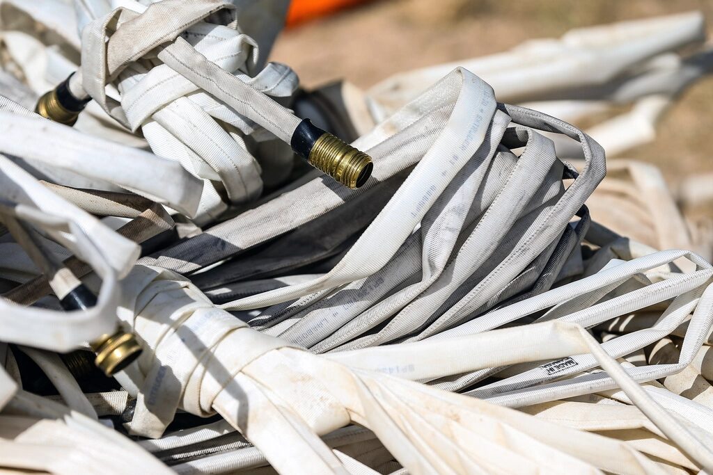 Coiled hoses with brass connectors